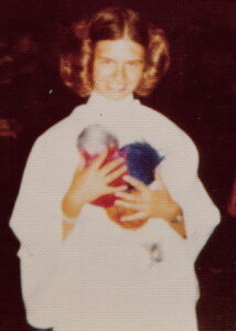 Suzanne as Princess Leia, holding tribbles